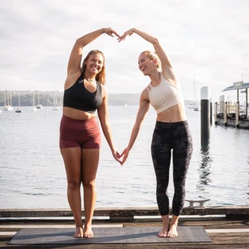 Sunrise yoga flow at Double Bay with breathtaking harbour views.